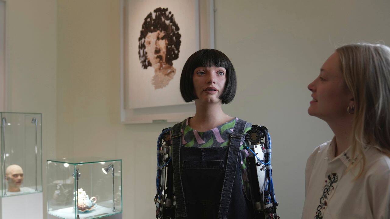 The Biennale also featured works by a robot artist, at a time when artificial intelligence is becoming increasingly present in everyday life. On display are mugs, plates and other household objects that were designed by Ai-Da, an ultra-realistic AI robot, using artistic algorithms and then printed using a 3D printer. &quot;I do not have thoughts and feelings like humans do,&quot; Ai-Da said, answering questions from AFP. &quot;But the objects mean a lot to me if they succeed in their aim, which is helping the viewer question the role of new technologies in our lives,&quot; the humanoid robot, sporting a bobbed haircut, added. (Image: AP)