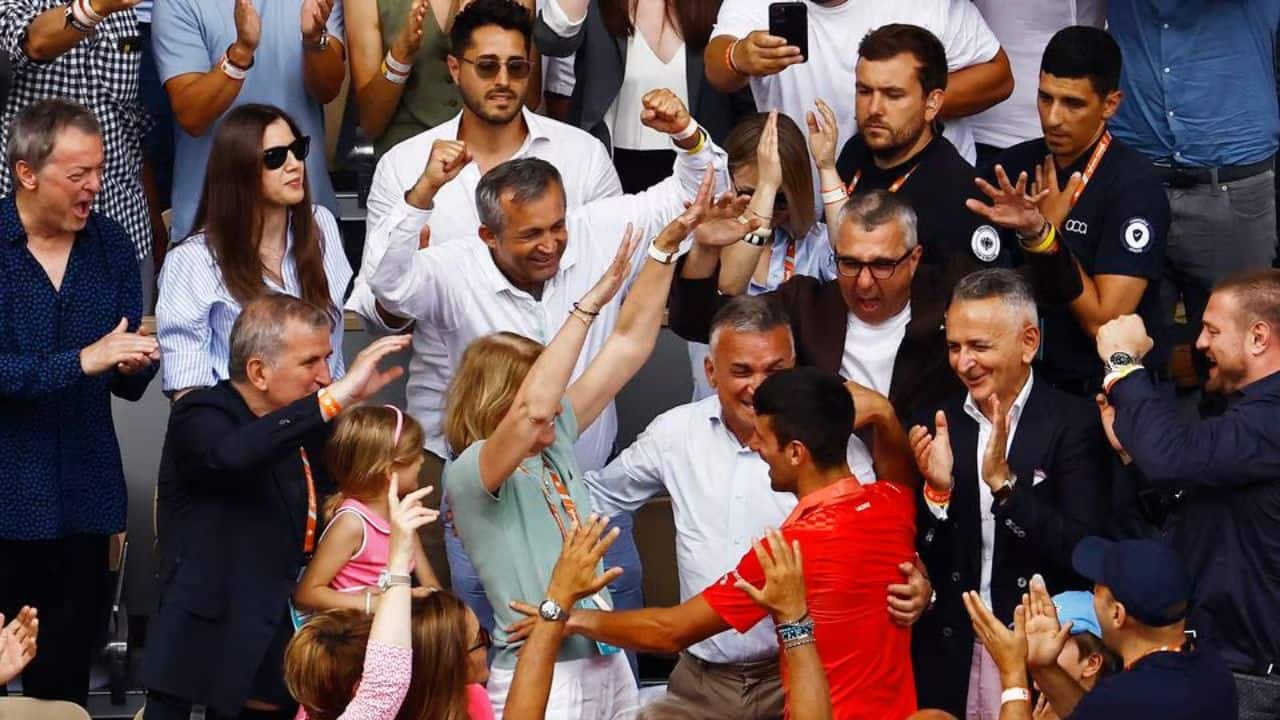 He continued his celebrations by climbing up to his players' box and shared hugs with his family. He then sported a specially made jacket with the number 23 displayed on it, just like he did at Melbourne Park with 22. (Image: Reuters)