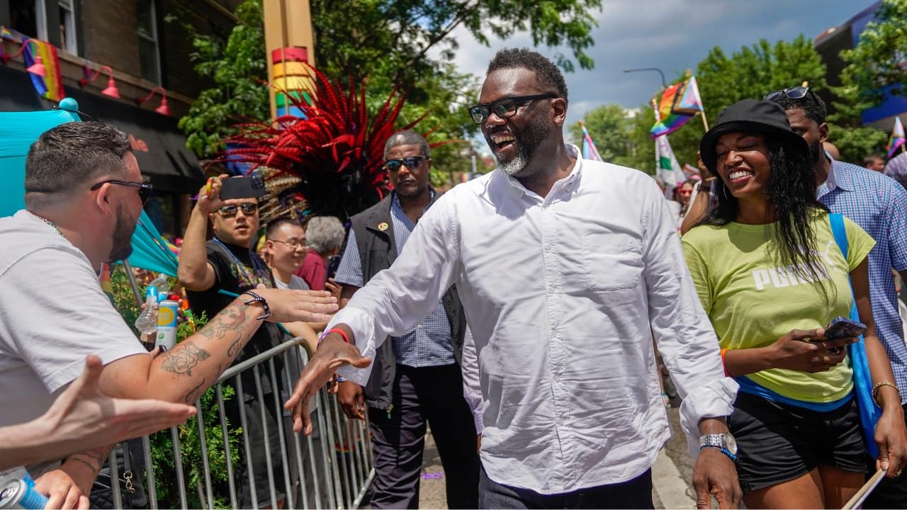 In Chicago, a brief downpour at the beginning of the parade didn’t deter parade goers, who took shelter under awnings, trees and umbrellas. “A little rain can’t stop us!” tweeted Brandon Johnson, the city's newly elected mayor. (Image: AP)