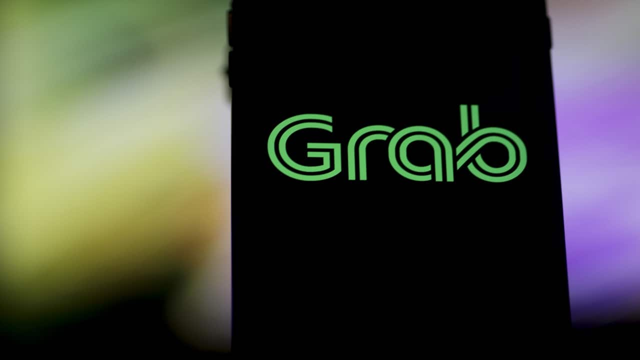 Grab cars must have TAXI light-box or logo