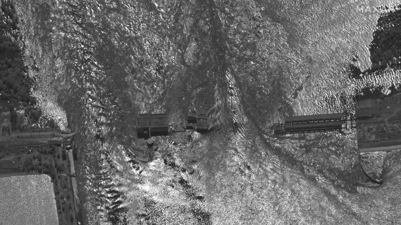 Britain's Ministry of Defense, which has regularly issued updates about the war, said the Kakhovka reservoir was at “record high” water levels before the breach. While the dam wasn't entirely washed away, the ministry warned that its structure “is likely to deteriorate further over the next few days, causing additional flooding.” (Image: Maxar Technologies via AP)