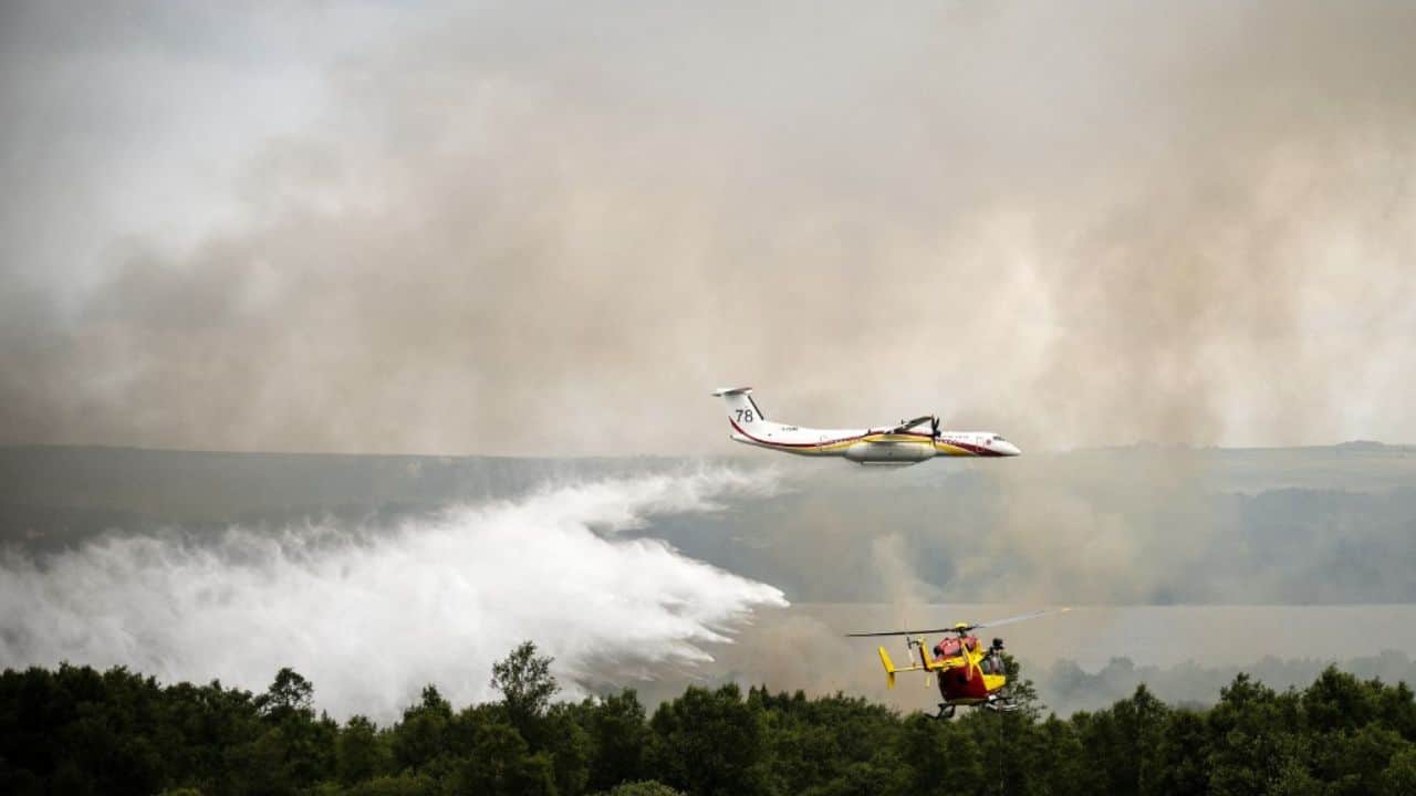 Canada awaits wildfire help, as thousands more may flee