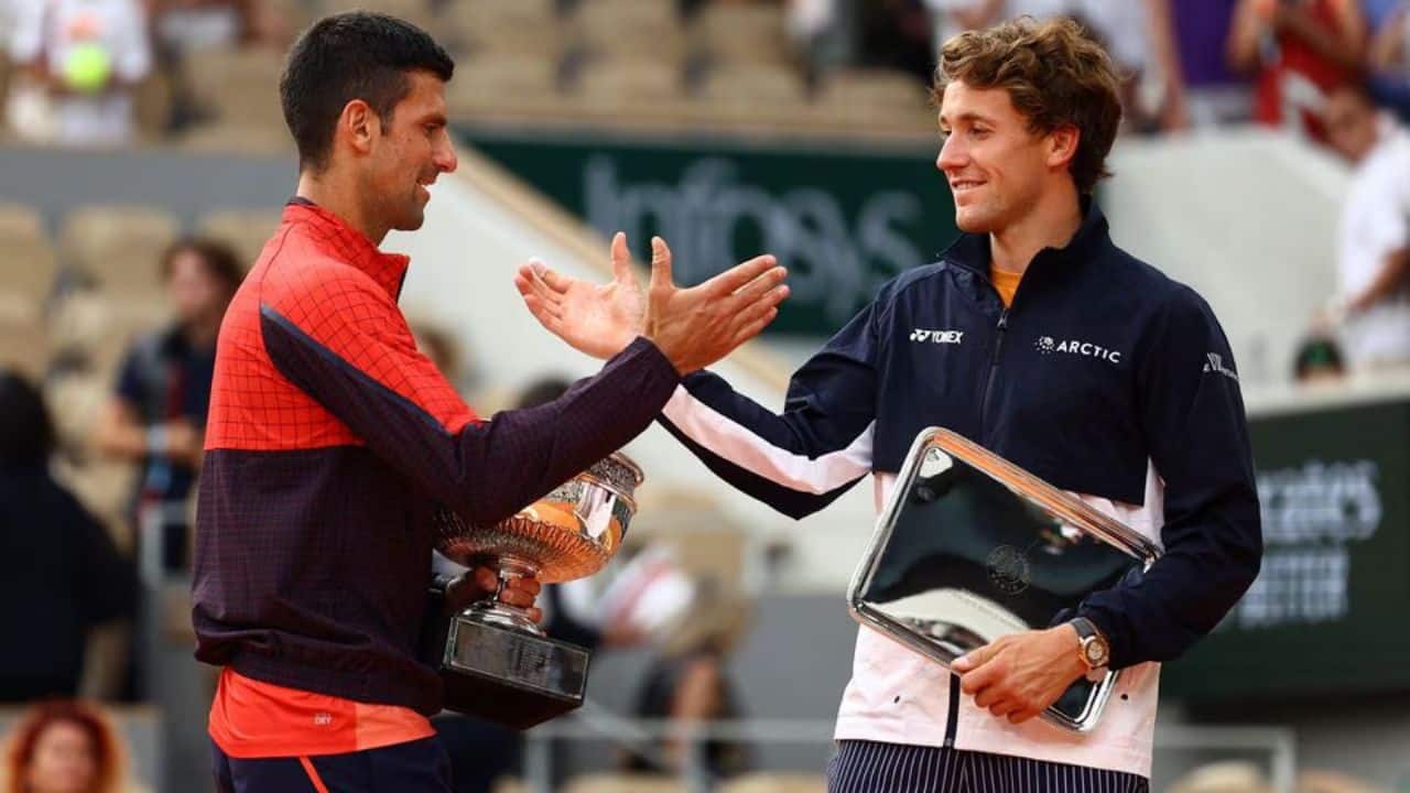 An unstoppable Novak Djokovic roared to a record 23rd Grand Slam singles title at the French Open on June 11 to stand alone at the summit of men's tennis with a 7-6(1) 6-3 7-5 victory over fourth seed Casper Ruud in the final. (Image: Reuters)