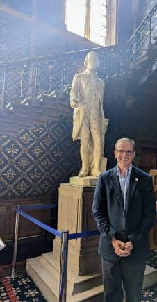 Professor Graeme Roy in front of the statue of Adam Smith in the University of Glasgow (Photo courtesy: University of Glasgow, Glasgow)