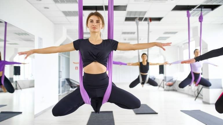 https://images.moneycontrol.com/static-mcnews/2023/06/Benefits-of-aerial-yoga-770x433.jpg?impolicy=website&width=770&height=431