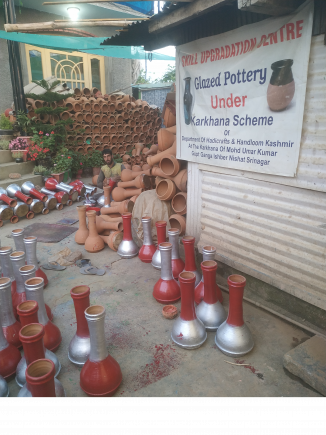 Glazed pots sitting outside Mohammad Umar Kumar's shop in Srinagar.
