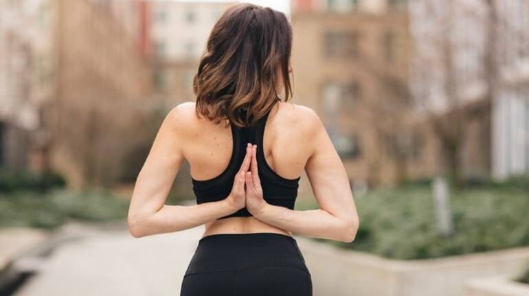 5 Essential Yoga Poses For People Who Sit At A Desk All Day