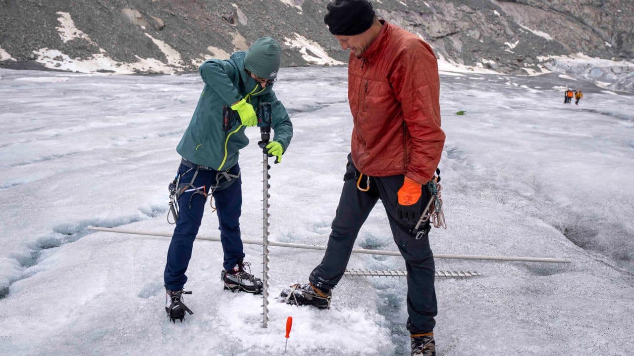 Glaciologist Matthias Huss and his team use measuring and monitoring equipment to keep tabs on how much they've shrunk and desperately try to maintain their mass. Workers prepare giant sheets to cover the ice like blankets at the Rhone Glacier, one of the largest in the Alps, in order to protect it from the summer heat. Although these sheets are a short-term solution to protect them, they have proven to be a little effective. (Image: AP)