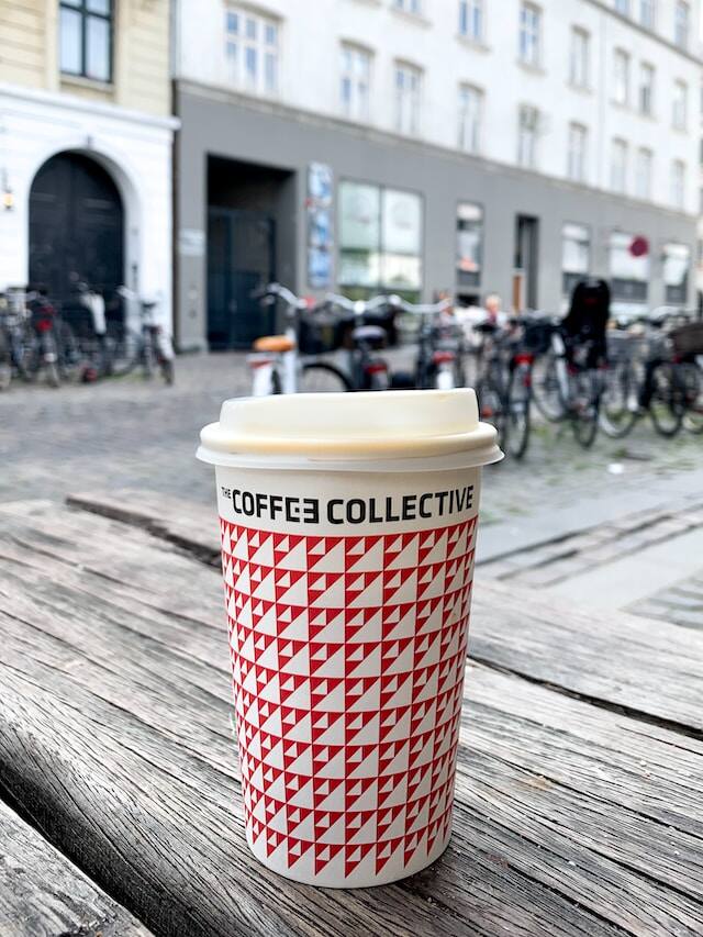 Get a coffee at Torvehallerne, Copenhagen. (Photo by Oskar Yildiz via Unsplash)