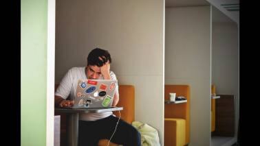 As artificial intelligence (AI)-driven layoffs rattle the industry, employees are ditching work-from-home (WFH) arrangements, fearing that visibility in the office could be key to job security. (Representative image)