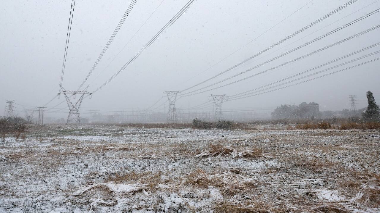 After getting her picture taken on Nelson Mandela Square in the financial district, Jennifer Banda told Reuters that she was pregnant the last time it snowed. &quot;Eleven years down the line, it's exciting that we have snow,&quot; she said. (Source: Reuters)