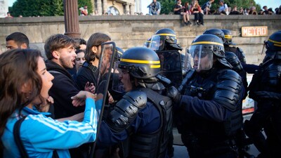 France has imposed night curfews in four northern cities after violent protests over rising living costs and fuel prices.