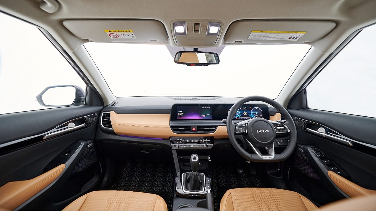 As mentioned earlier, Kia has refreshed the interiors too, of the Seltos. We start off with the new 10.25-inch touchscreen infotainment system, complete with voice control and smartphone connectivity. The instrument cluster is also made up of a 10.25-inch digital display that connects seamlessly to the infotainment screen. The centre console has been redesigned with slimmer AC vents and physical buttons for climate control as well as the infotainment system. There are more soft-touch materials around the cabin for added luxury. Additionally, the interior colour scheme can be optioned in three different colour combinations. (Image: Kia)