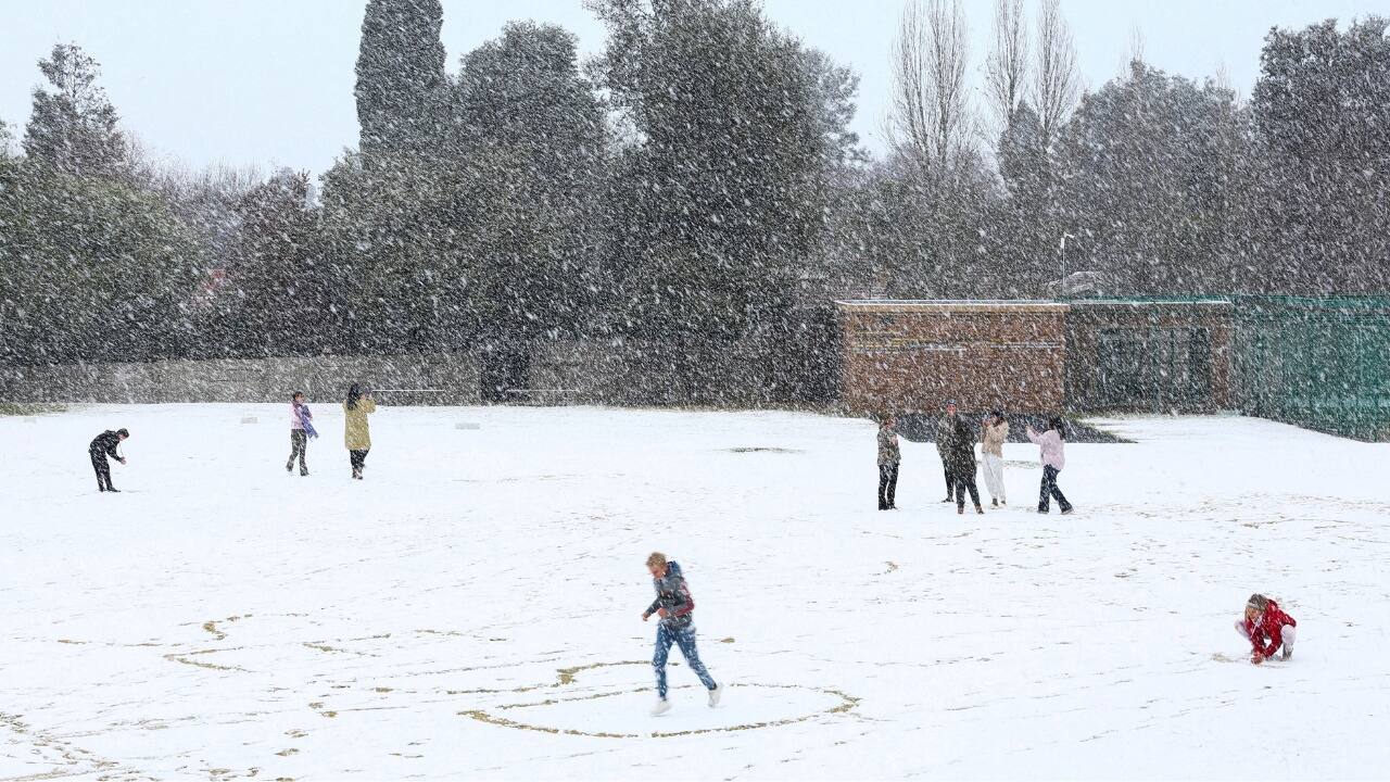 South of the city in Brackenhurst, a Reuters photographer saw children making snowballs and snow angels in a school's grounds. (Source: Reuters)
