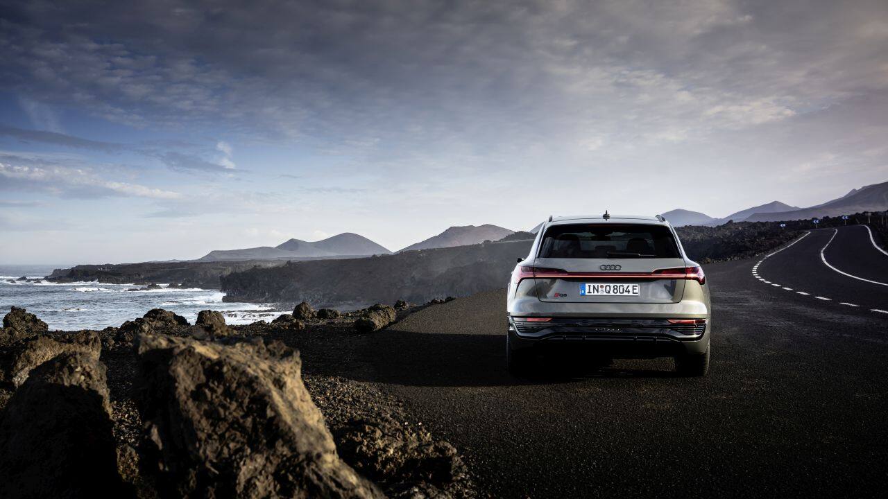 The Audi Q8 e-tron started life off as just the Audi e-tron. With the new naming scheme, Audi has brought the car more into family nomenclature. As part of the facelift, the Q8 e-tron and Q8 Sportback e-tron get subtle design changes all around the car. The front is defined by a new, redesigned grille complete with black surrounds, tweaked headlamp units, larger air inlets and a tweaked bumper. In profile, the EV gets a new set of 20-inch aero alloys that are specific to the India models. At the rear, too, there is a new set of tail light clusters and a re-profiled bumper. The obvious difference between the two, however, is the sloping roofline at the rear on the Sportback e-tron. Don’t forget Audi’s new 2D logo that is tacked on to the front and rear of the SUVs. (Image: Audi India)