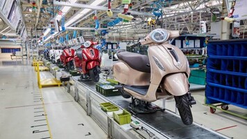Bajaj Auto board to consider share buyback on January 8; stock jumps 5%, tops Rs 7,000
