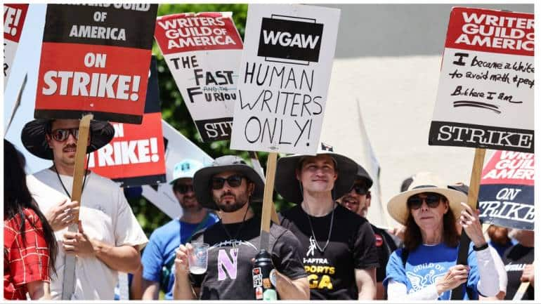 Why are Hollywood actors and writers on strike and what are their demands?