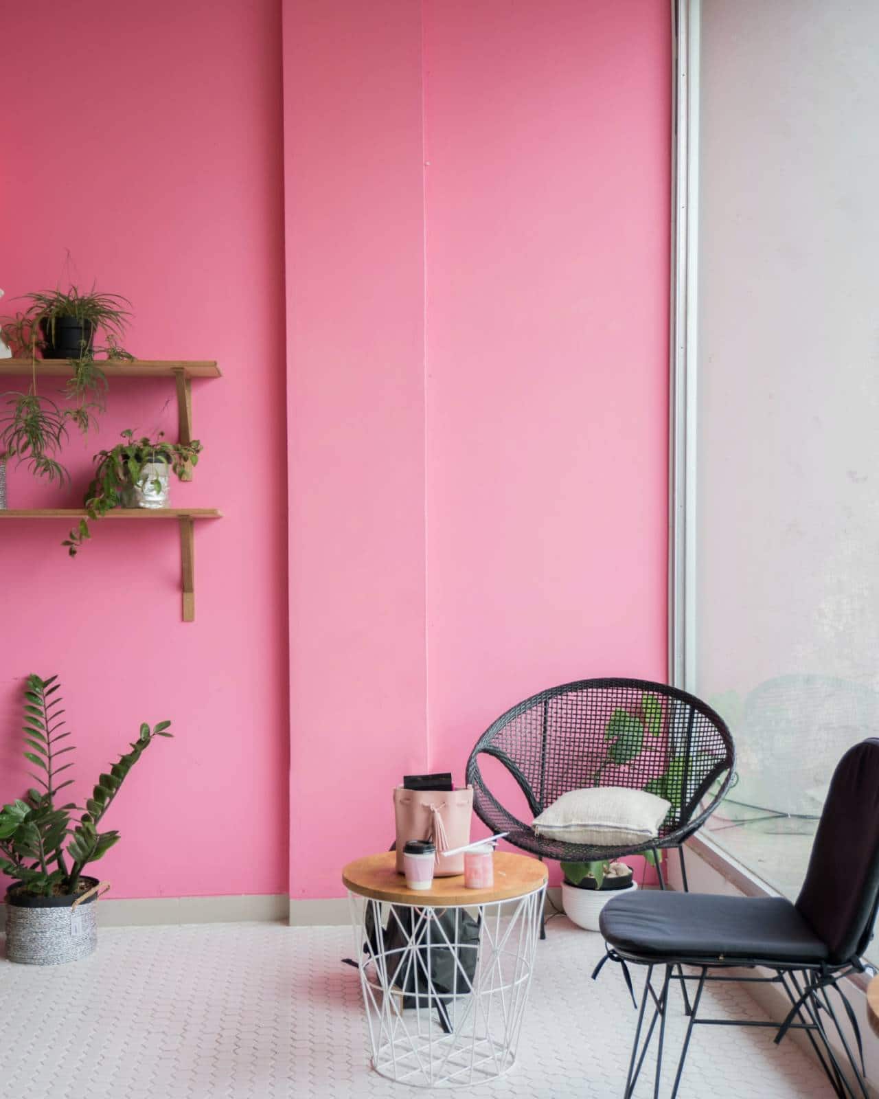 Create a cozy nook with pink (Photo by Stefen Tan via Unsplash)