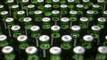 Heineken lowers earnings forecast as beer consumption drops