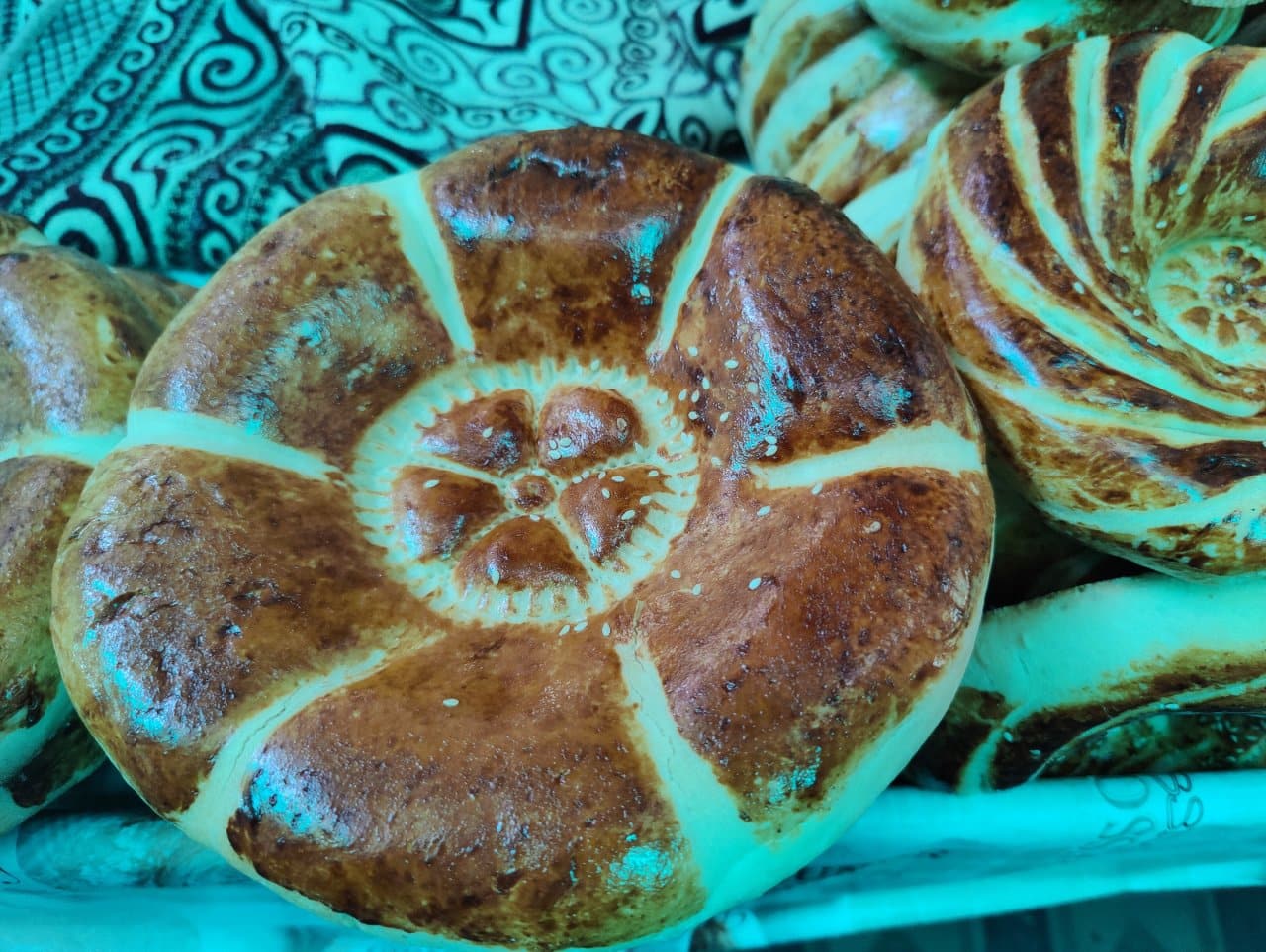 It is said that the smell of the oil when you are frying baursak bread floats high into the sky, so that dead loved ones can feed on the aroma and enjoy them, along with you. (Photo by Kalpana Sunder)