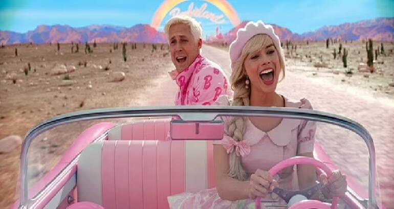 A still from 'Barbie' referencing the Pink-bricked road in 'The Wizard of Oz' (1939).