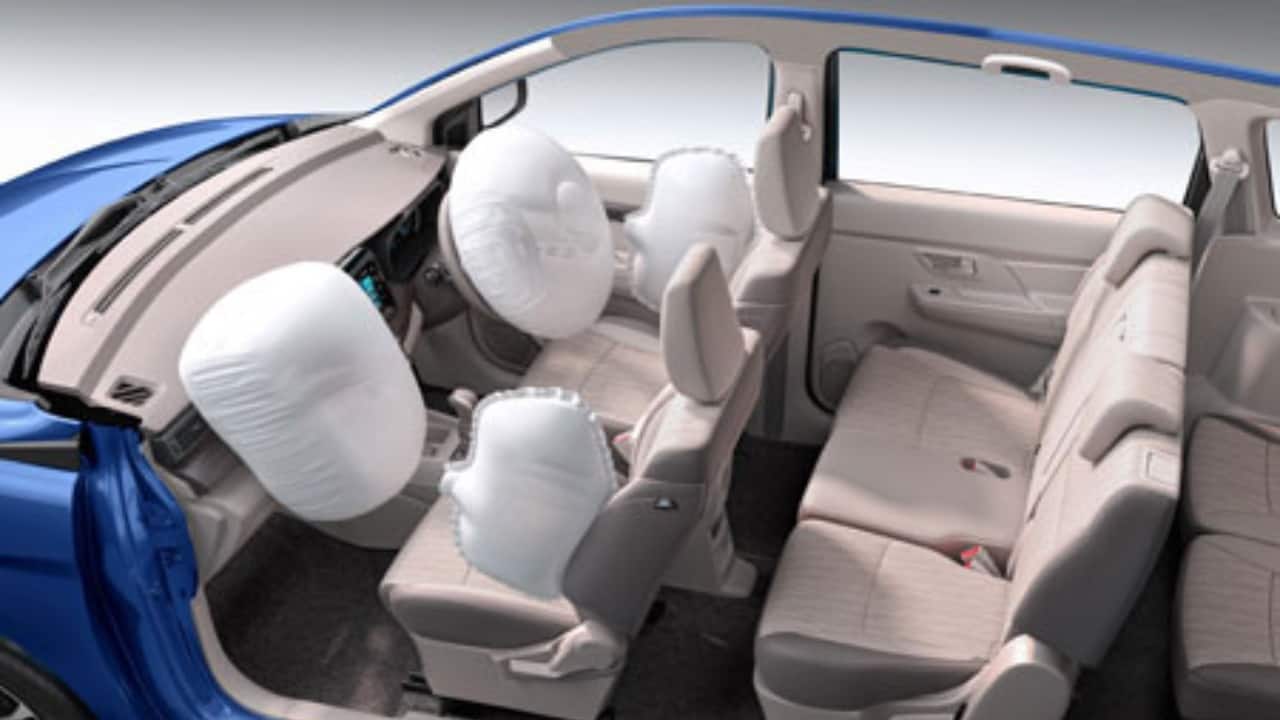 Moving over to the interiors, you will be greeted by a very familiar cabin. The layout of the Rumion is identical to the Ertiga and you get the same kind of features, too, including the 7-inch touchscreen infotainment system complete with wireless Android Auto and Apple CarPlay, 4-speaker Arkamys Surround Sense sound system, and roof-mounted AC vents with dedicated fan speed controls for the second-row passengers. Like the Ertiga, the Rumion is also a 7-seater and the second row gets a folding centre armrest. It also gets a slightly different dual-tone interior colour theme but like the Ertiga, the Rumion also gets a wood trim on the layered dashboard. (Image: Toyota Bharat)