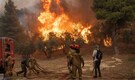 Rescuers in Greece find 18 bodies as wildfires spread