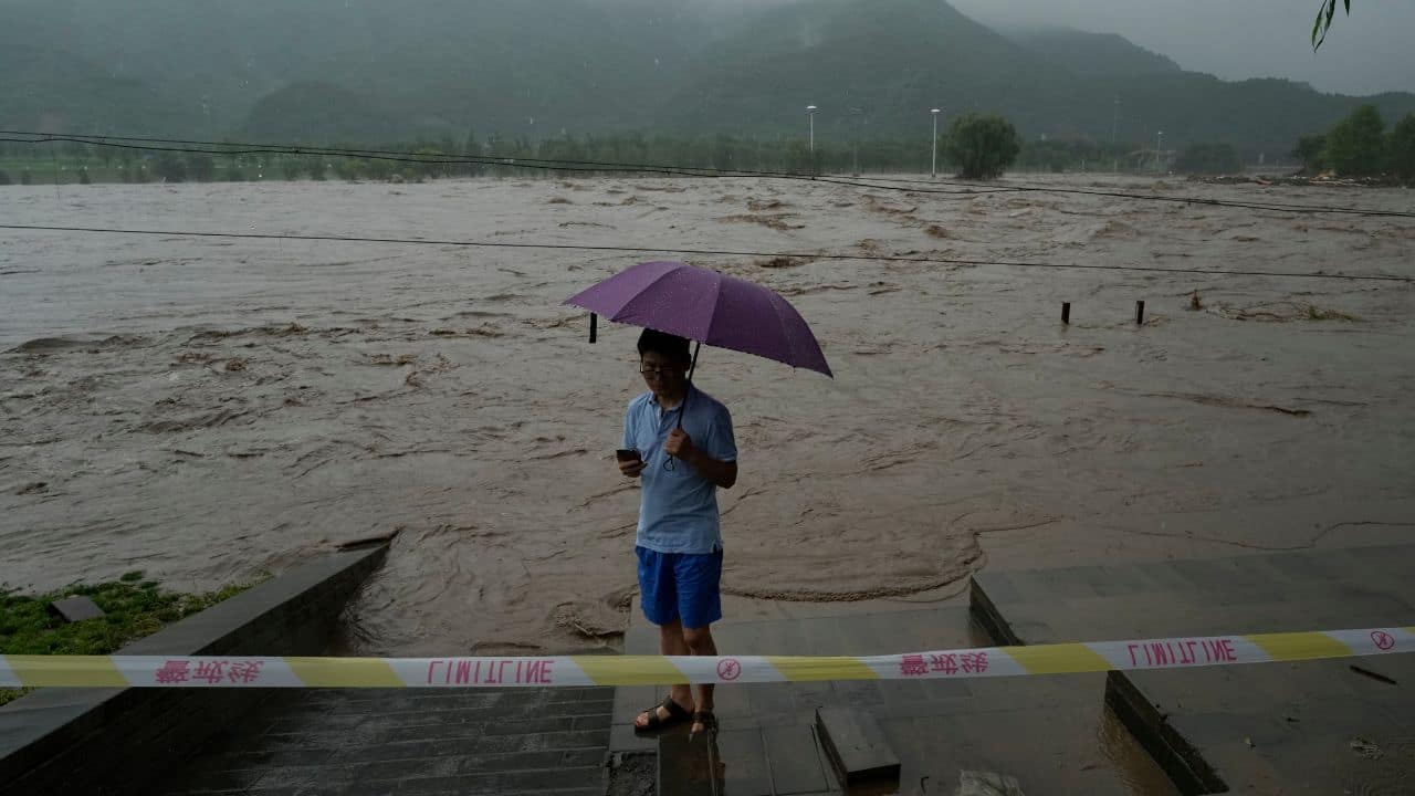 In Pics: 20 Dead, 27 Missing In Beijing Floods, Thousands Evacuated