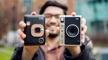 Fujifilm Instax Mini Evo, a hybrid camera from Fujifilm, offers all the analog charm of instant prints, but with digital control thanks to a small LCD screen.