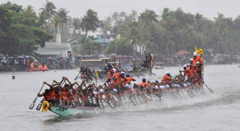 Veeyapuram snake boat rowed by Pallathuruthy Boat Club, Alappuzha crossing the finish line to win the coveted Nehru Trophy Boat Race on August 12