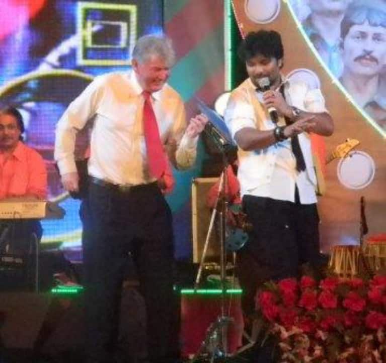 Steve Darby shakes a leg with Babul Supriyo. (Photo courtesy: Steve Darby)