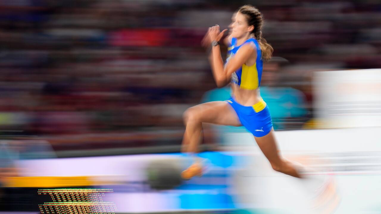 Courage amidst chaos: Fleeing her hometown of Dnipro due to the war, Mahuchikh displayed immense courage. Her training journey took her to Germany and Belgium, where she pursued her passion despite the turmoil back home. (Image: AP)