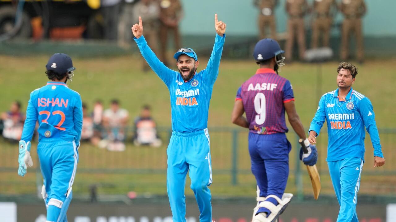 Kohli had dropped Aasif at short extra covers early on and the batter also successfully reversed an onfield lbw decision against him off Yadav before raising his half century off 88 balls. Kohli finally caught Aasif when Siraj found a leading edge in the 30th over and followed it with the wicket of Gulshan Jha before rain arrived and stopped play for an hour. (Image: AP)