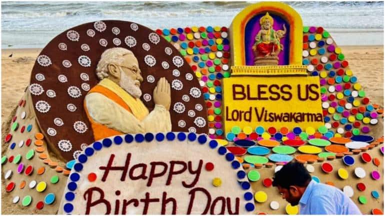 Delhi BJP workers prepare 69 kg laddu shaped cake to mark PM Modi's birthday