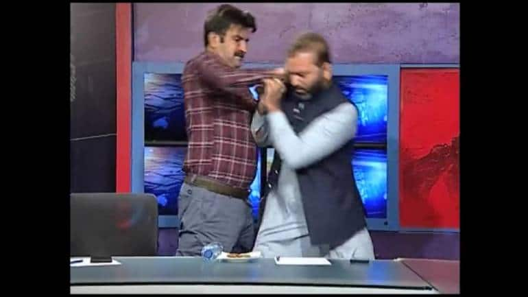 Pakistani politicians kick, punch and abuse each other in shocking video