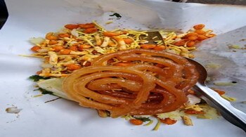 Poha with jalebi is a popular combination for breakfast or snack in Indore.