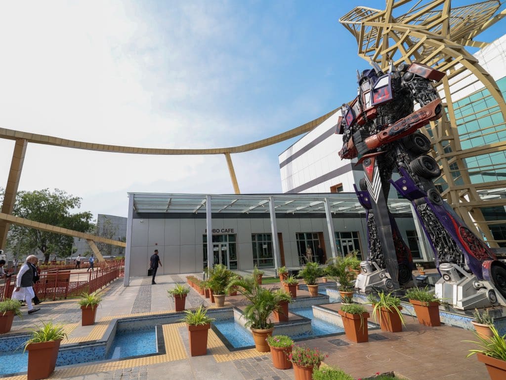 On September 27, Prime Minister Narendra Modi embarked on atrip to Ahmedabad, Gujarat. During his visit, he made a notable appearance at Science City to delve into the realm of robotics. (Image: X)