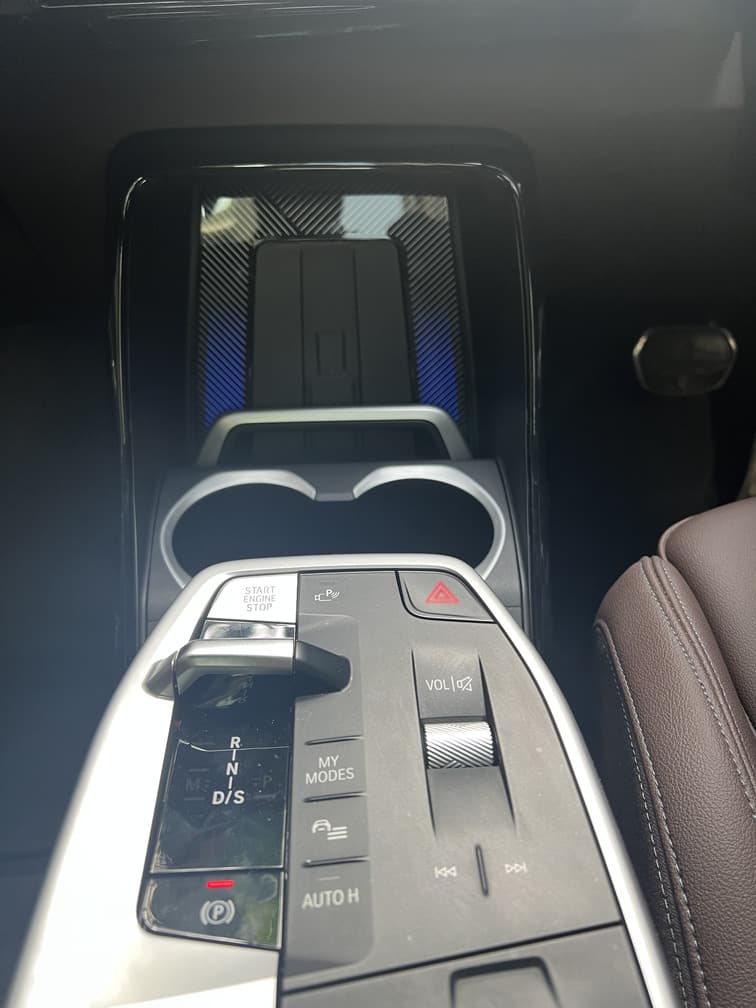 The BMW X1's vertical phone charging tray