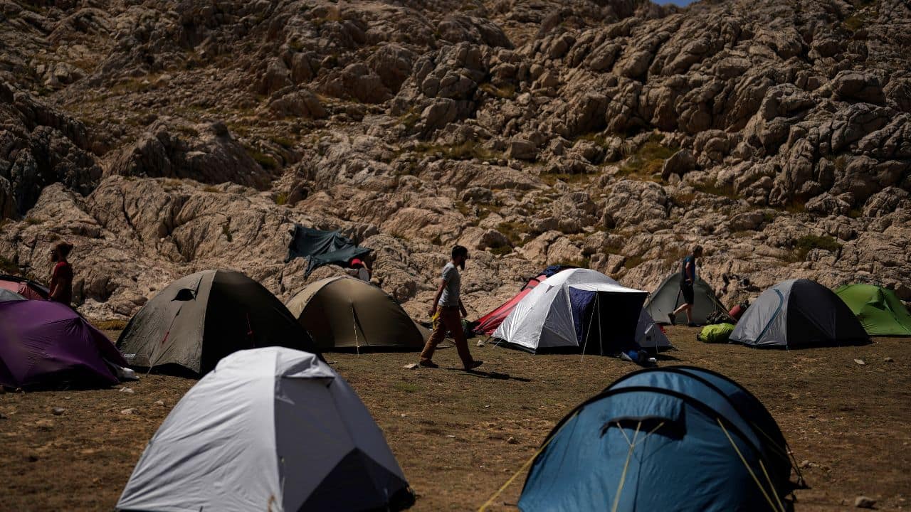 As Dickey is being gradually rescued from the cave, temporary medical camps have been established up along the tube to offer assistance and somewhere to rest. (Image: AP)