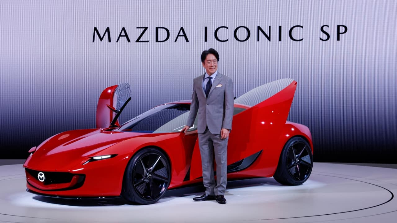 Mazda Puts Iconic Rotary Engine Into Plug-In Hybrid | Mazda Motor unveiled a concept sports car that uses the carmaker’s rotary engine technology in a hybrid powertrain with a battery that can also be plugged in for charging. The vehicle can be used for everything from commuting, to driving on racetracks or for weekend outings, he said. “We want to expand the circle of people who feel love for cars,” CEO Masahiro Moro said of the “Mazda Iconic SP” prototype. (Image: Reuters)