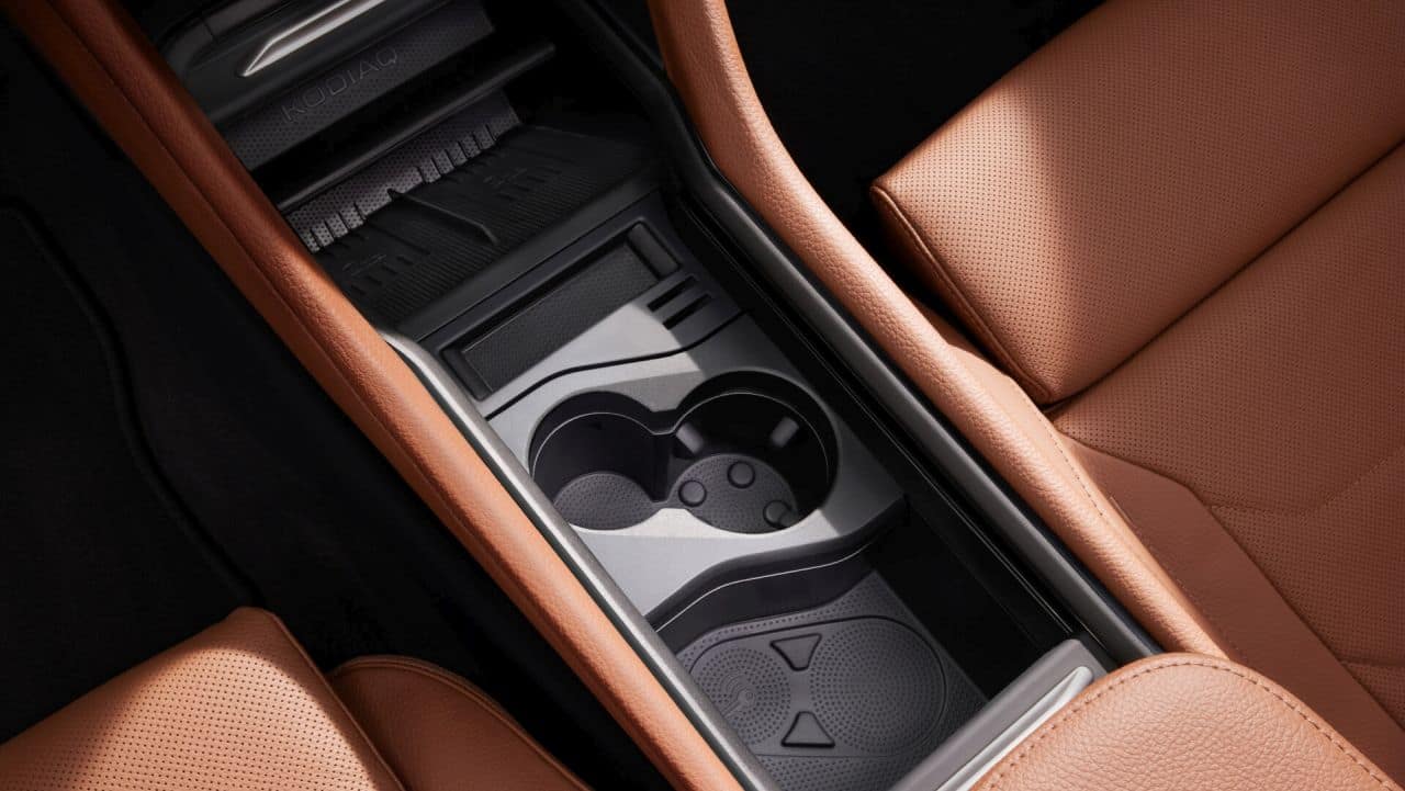 Stepping inside, you see an all-new cabin layout. A chunky new multi-layered dashboard takes over the front with the highlight of the car in the centre, a swanky new 12.9-inch infotainment screen. Lower down, Skoda has adopted something of a hybrid design for the HVAC controls. Three 1.25-inch screens now sit inside knobs just below the central AC vents. The two outer dials control the cabin temperature and heat ventilation and heating for either the passenger side or the driver side while the knob in the centre can be modified to adjust other functions like fan speed, infotainment system volume, air direction and smart air conditioning. (Image: Skoda)