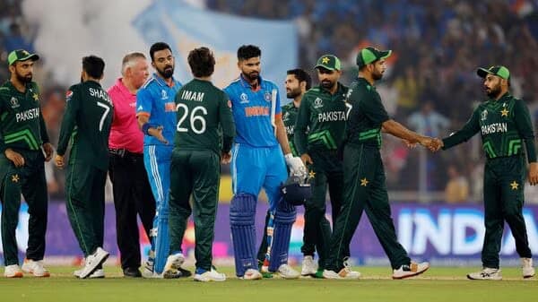 Pakistan's Imam-ul-Haq shakes hands with India's KL Rahul and Shreyas Iyer after the match between India and Pakistan at <a rel=
