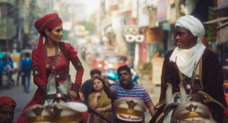 Samuel Abiola Robinson (right) and Geetika Vidya Ohlyan in a still from Dilli Dark.