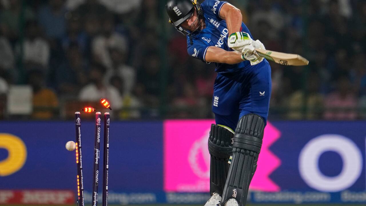 During the ICC Men's Cricket World Cup match between Afghanistan and England in New Delhi, India, on Sunday, October 15, 2023, England's captain Jos Buttler was bowled out by Afghanistan's Naveen-ul-Haq. (Image: AP)