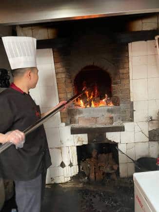 Peking duck being grilled. (Photo Neeta Lal)