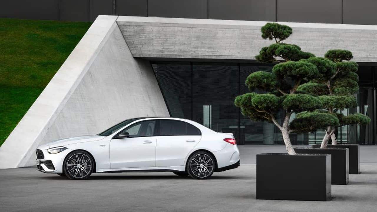The 2023 Mercedes-AMG C 43 showcases a new era of design aesthetics. To differentiate it from the standard C-Class sedan, the C 43 boasts several striking exterior features. The most prominent among them is the Panamericana grille adorned with vertical slats. The front end has undergone a significant transformation. It features adaptive LED headlights complete with LED DRLs. The larger air intakes on the front bumper, accompanied by black accents, gloss-black wing mirrors, beefier side sills and 18-inch alloy wheels add to the athletic and aggressive appearance that AMG stands for. (Image: Mercedes AMG)