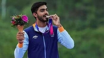 Silver medallist Indian shooter Anant Jeet Singh Naruka poses for photos during the presentation ceremony of men's skeet event at the 19th Asian Games, in Hangzhou, China, Wednesday, Sept. 27, 2023. (PTI Photo)