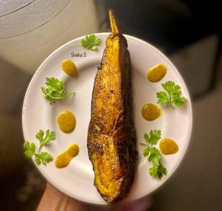 Odiya speciality of fried baingan with mustard sauce. (Photo: Sneha Senapati)