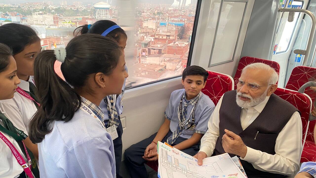 PM Modi buough the first ticket of Namo Bharat and interacted with school children inside the train. (Image: PMO/X)