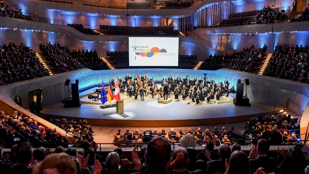Germans celebrated the 33rd reunification day on October 3. People attended a ceremonial event at the Elbpharmonie in Hamburg, Germany, to commemorate the German reunification. (Image: AP)